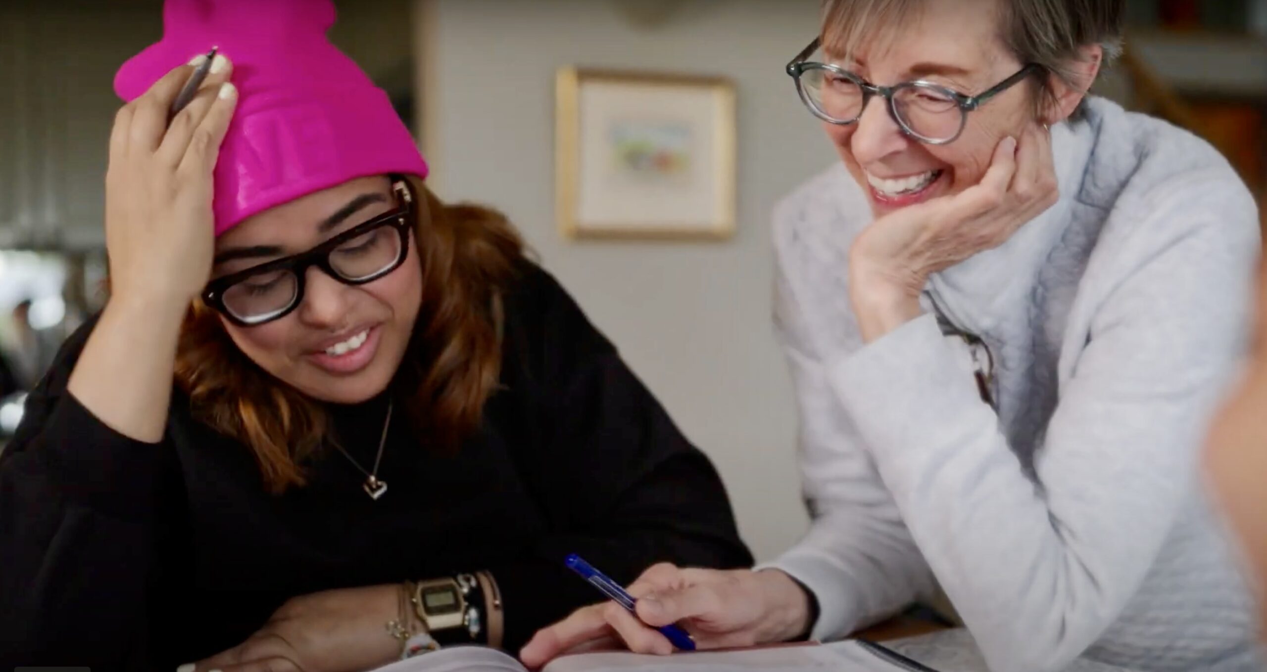 Two women learning English.